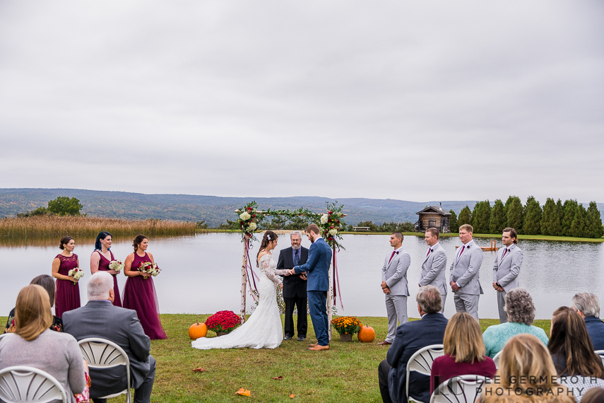 Ring exchange at ceremony -- Alyson's Orchard Fall Wedding Photography by Lee Germeroth Photography