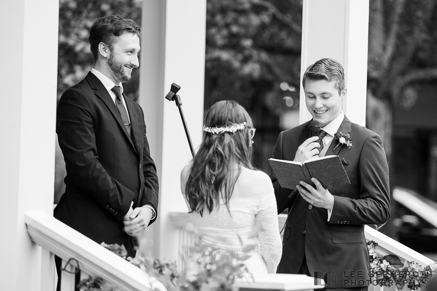 Reading Vows at Ceremony -- Belknap Mill Wedding Photography by Lee Germeroth Photography