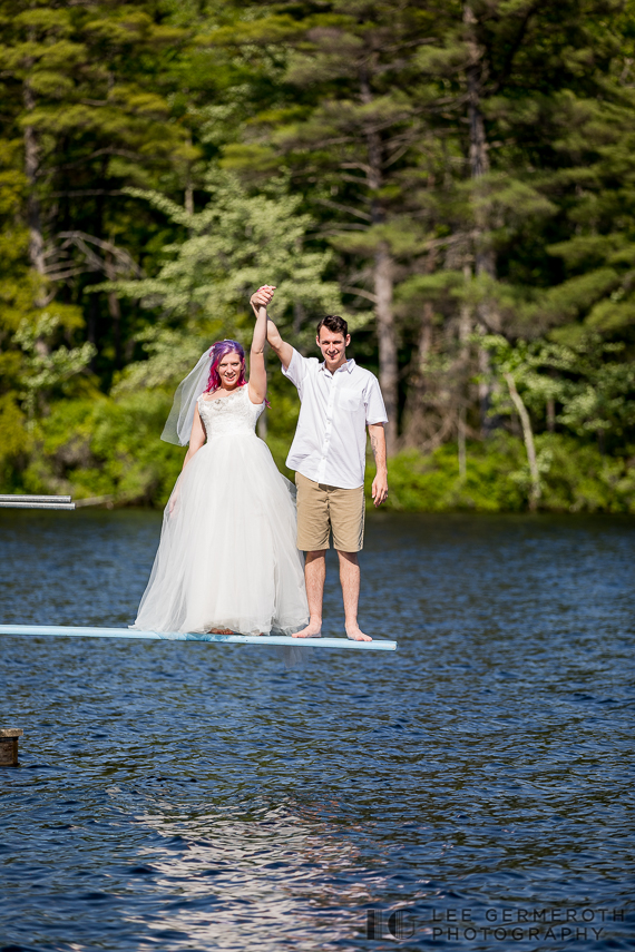 Bride and groom about to jump into lake -- Camp Takodah Wedding in Richmond NH by Lee Germeroth Photography