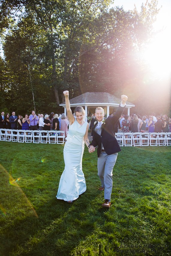 Bride and groom walking down aisle -- Hidden Hills Rindge NH Wedding by Lee Germeroth Photography