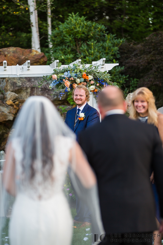 Groom seeing bride walking down the aisle | Hidden Hills Estate Rindge NH Wedding Photography by Lee Germeroth Photography