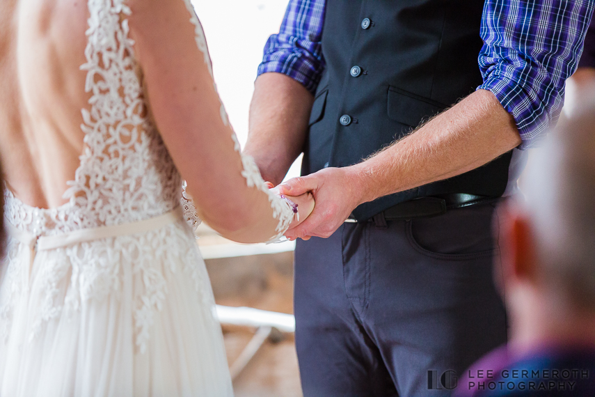 Holding hands at ceremony -- Inn at Valley Farms Walpole NH Wedding by Lee Germeroth Photography