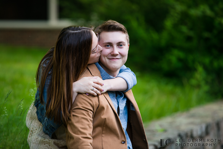Kat & Trev Kissing on the cheek -- UNH Durham NH Engagement Session by Lee Germeroth Photography