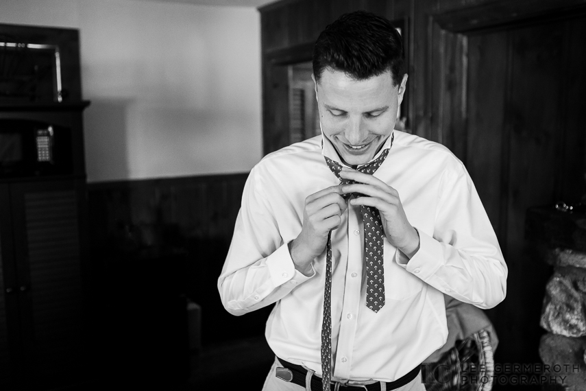 Detail photo of groom getting ready -- Woodbound Inn NH Wedding Photography by Lee Germeroth Photography